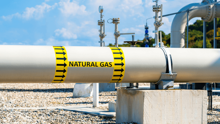 Natural gas pipeline with warning signage