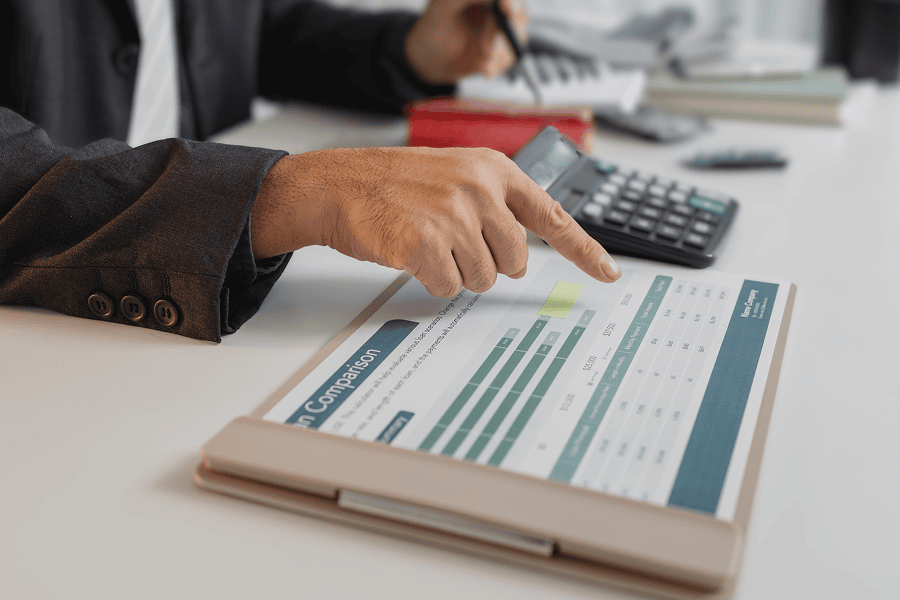 man pointing at report