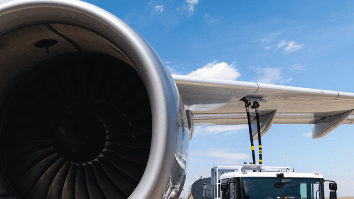 truck fueling airplane