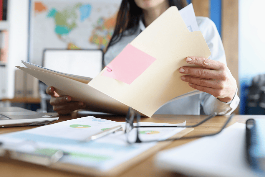 Woman looking over documents
