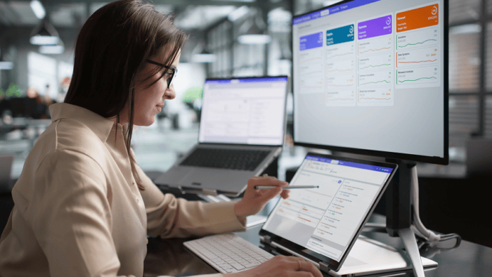 woman looking at laptop screen